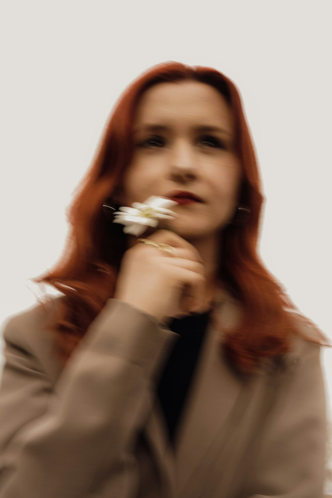 Portrait of a young Croatian woman content editor with auburn hair
