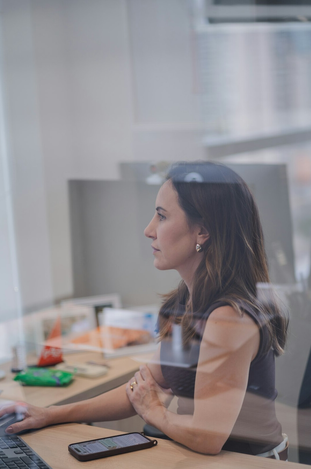 woman coding at desk